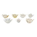 Seven early 19th century and later teapots, including a Minton tea pot of oval form with gilt decora... 