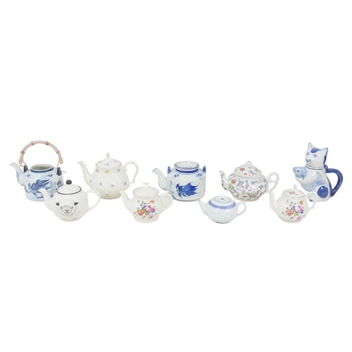 6 - Nine 20th century British and oriental teapots, including two japanese blue and white teapots, toget... 