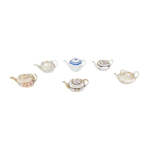39 - Six 18th century and later English teapots, including an 18th century, octagonal form, blue and whit... 
