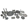 A collection of pewter, including oval serving dishes, largest 41.5cm diameter, a tankard, and cruet... 