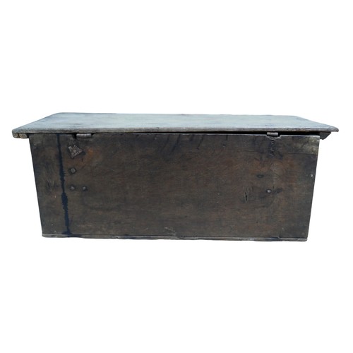 138 - A 19th century oak Bible box, with a blind carved frieze panel to its front, 65 by 39 by 26cm high.