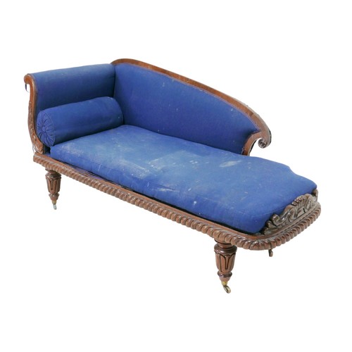 267 - A Victorian chaise longue, with mahogany frame and blue upholstery, raised upon brass castors, a/f, ... 