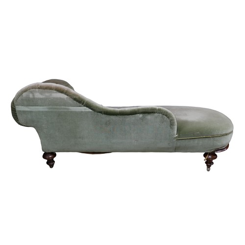 270 - An Edwardian chaise longue, with walnut frame and button backed green upholstery, raised upon castor... 