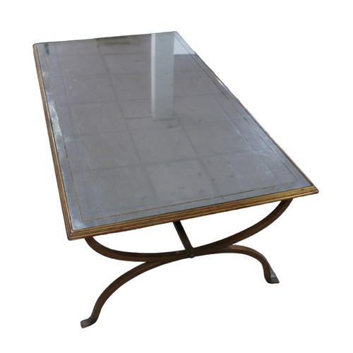 258 - A 20th century mirrored topped coffee table, with bronzed metal base, 132 by 76 by 50.5cm high.