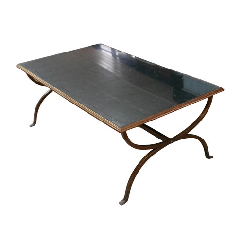 258 - A 20th century mirrored topped coffee table, with bronzed metal base, 132 by 76 by 50.5cm high.