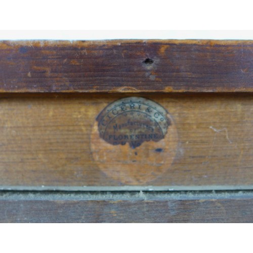 155 - A 19th century, Continental over painted print on panel, depicting a lady in a domestic interior sce... 