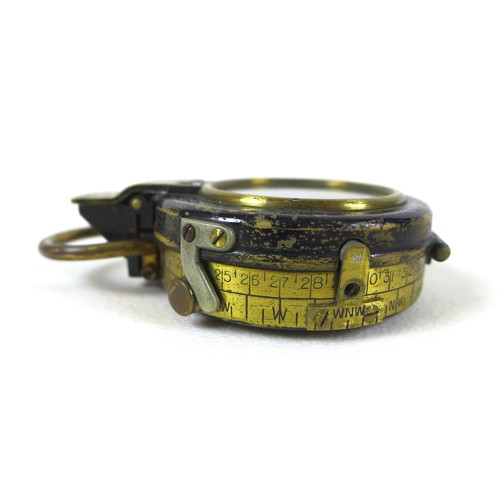 106 - Two military compasses, comprising a 1917 WWI Verners Marching Compass, No 97506, with D. Stocks Edi... 