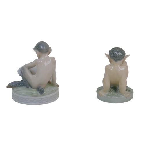 31 - Two Royal Copenhagen figurines of fawns, comprising a fawn with a rabbit (439) and a fawn with a fro... 