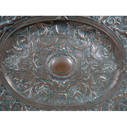 45 - A 19th century French copper and silver plated tray, of oval form with wide rim and high footrim, ca... 