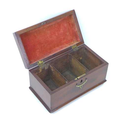 139 - A Georgian mahogany tea caddy, with brass fittings and three compartments to its interior, raised up... 