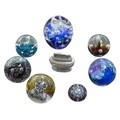 A collection of six paperweights, comprising four Caithness paperweights, 'Wavecrest, 'Sea Dance', '... 