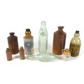 A group of stoneware and glass bottles, including one by Lovatt & Lovatt Ltd, 20cm, and a Rawlings b... 