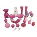 A collection of cranberry glass items, including bonbon dishes, bowls, and glasses, a/f, together wi... 