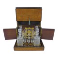 A 19th century French cave à liqueur, comprising four carafes, with frosted design, 20.5cm high, a t... 