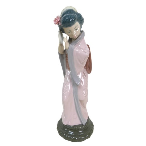 58 - A collection of oriental Lladro pieces, including 'Madame Butterfly' figurine, 4991, 30cm high, 'Tim... 