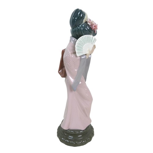 58 - A collection of oriental Lladro pieces, including 'Madame Butterfly' figurine, 4991, 30cm high, 'Tim... 