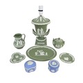 A collection of Wedgwood Jasperware items, including a lamp base of urn form decorated in the typica... 