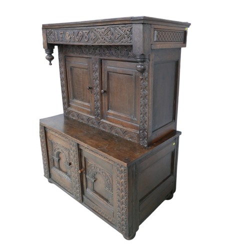 348 - A Jacobean style oak cabinet made from older timber, probably 19th century, decorated with carved in... 