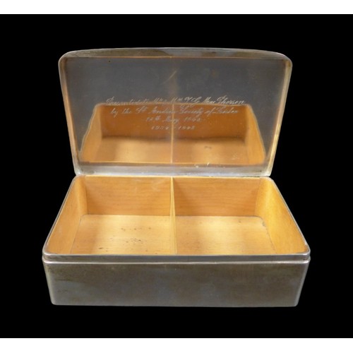 36 - A Portuguese silver presentation cigarette box, with cedar wood lining, bearing inscription 'Present... 