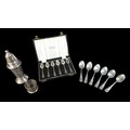 A collection of silver, including a sugar sifter with weighted base, cased set of six  teaspoons and... 