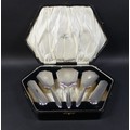 A cased silver dressing table set, together with two napkin rings. (1 case)