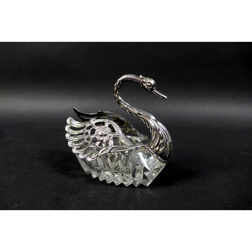 4 - A collection of silver, white metal, and plated wares, comprising two silver plated pheasants, 13.5c... 