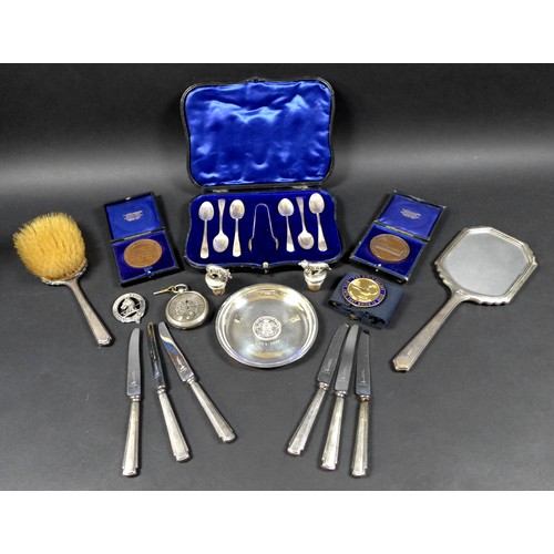 18 - A group of silver and collectables, including a cased set of teaspoons, a coin inset dish, two bottl... 