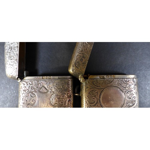 26 - A collection of seven Victorian and later silver vesta cases, including a Victorian vesta case beari... 