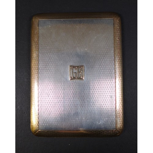 40 - An Asprey George V silver and yellow metal cigarette case, mounted initials to the front 'GB', engin... 