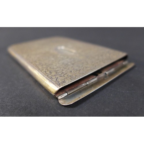 21 - A Victorian silver card case, with hinged flap top, stamped 'Needham's Patent' engraved foliate deco... 