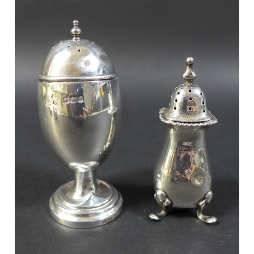 35 - A group of silver items, including a Georgian silver helmet shaped cream jug, 14.5cm high, ovoid sha... 