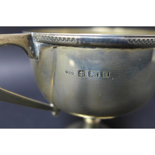 23 - A George V twin handled trophy cup, G Bryan & Co. Birmingham, possibly 1913, 6toz, 16.5 by 10 by 13.... 