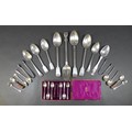 A group of silver and silver plated flatware, including two fiddle pattern basting spoons, 30cm, two... 
