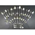 A group of silver flatware, mostly spoons, 22 to 11cm, together with a silver caddy spoon, 8cm, and ... 