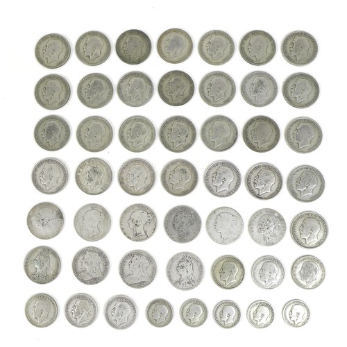 76 - A collection of GB silver coinage, mostly pre 1920, including a half-crowns, florins, and shillings,... 