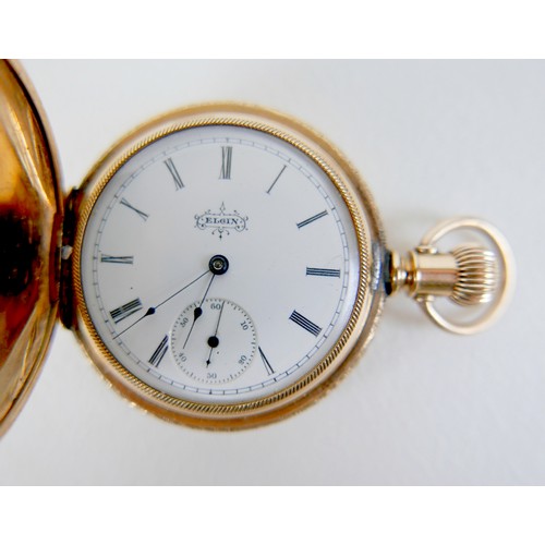 125 - An American Elgin yellow metal cased full hunter pocket watch, with Roman numeral dial and a subsidi... 