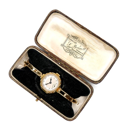 112 - A lady's 18ct gold cased Art Deco wristwatch, Arabic numerals, blued steel hands, on articulated gol... 