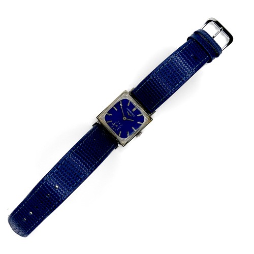 128 - A Longines Art Deco white gold plated wristwatch, with square blue dial, on blue lizard skin strap, ... 