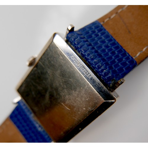 128 - A Longines Art Deco white gold plated wristwatch, with square blue dial, on blue lizard skin strap, ... 