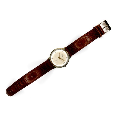 115 - A Velona 14ct gold cased gentleman's wristwatch, silvered dial, on brown leather strap, 34mm case.