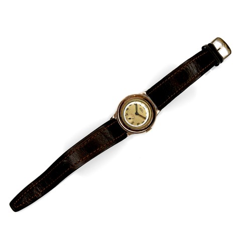 116 - A Trebex 9ct gold cased gentleman's wristwatch, circa 1940s, on a modern brown strap, 30mm case.