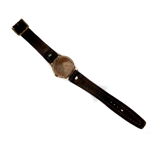 116 - A Trebex 9ct gold cased gentleman's wristwatch, circa 1940s, on a modern brown strap, 30mm case.