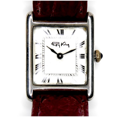 97 - A Roy King silver cased gentleman's wristwatch, with white square dial, on a red strap, 23.5mm case.