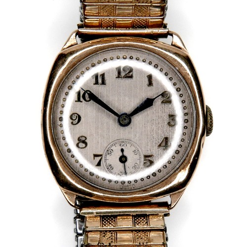 109 - An Art Deco 9ct gold cased gentleman's wristwatch, unsigned, with silvered dial, on expanding bracel... 