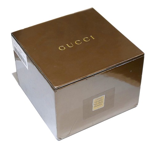 98 - A Gucci stainless steel lady's wristwatch, with G-shaped bezel, model 125.5, serial 12006382, rounde... 