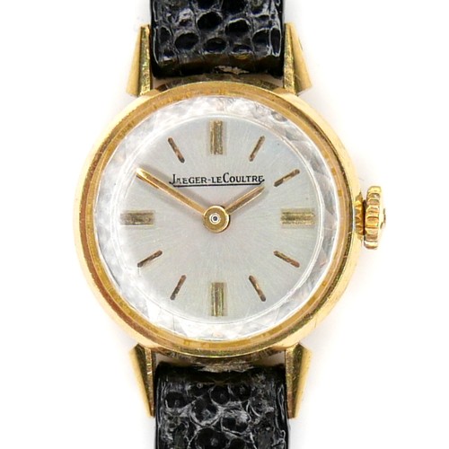 130 - An 18k yellow gold Jaeger-LeCoultre lady's cocktail watch, the silver dial with gold batons, gold ha... 