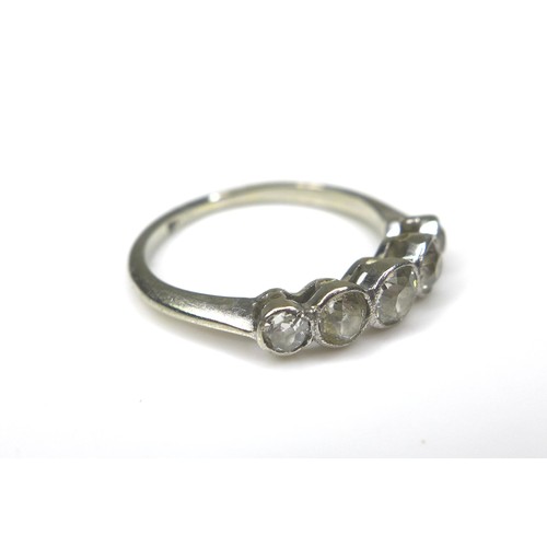 243 - A five-stone diamond and white metal ring, size H/I, 1.9g.