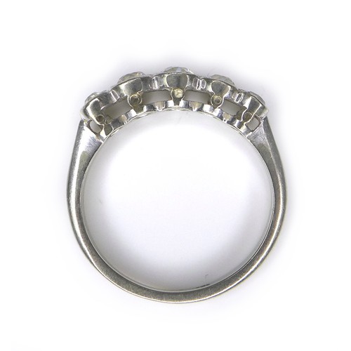 243 - A five-stone diamond and white metal ring, size H/I, 1.9g.