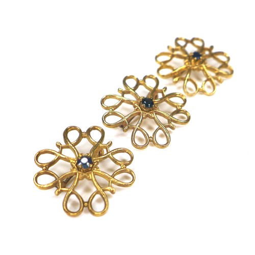 170 - Three pieces of 9ct gold and sapphire brooches, each 2.2 diameter overall, 6.5g gross. (3)