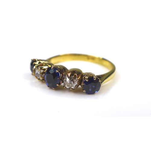 286 - An 18ct gold sapphire and diamond five stone ring, size P/Q, 4.3g.